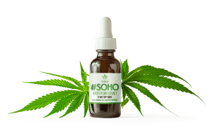 Bottle of CBD Beleaf's Soho Oil in front of a cannabis leaf